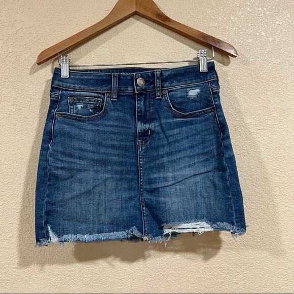 American Eagle Outfitters  lightly distressed medium blue high rise mini skirt - Picture 1 of 6